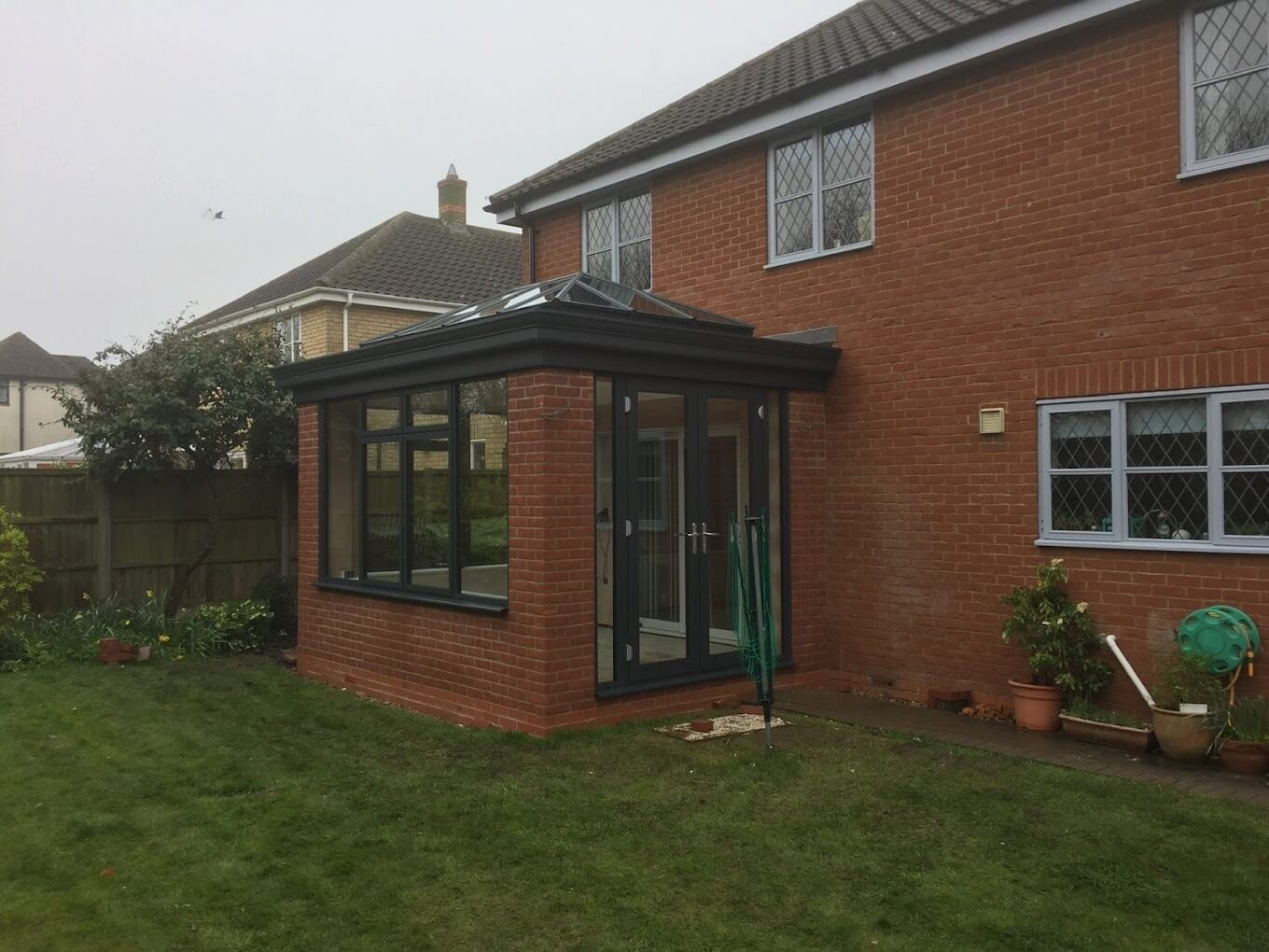 Brick home extension with roof lantern built by Ciampa and Sons in Cambridge