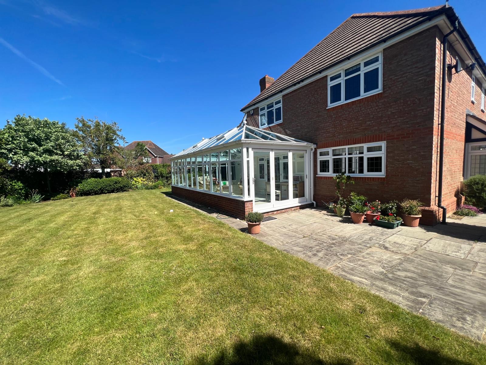 Large white conservatory completed by Ciampa and Sons in Cambridge