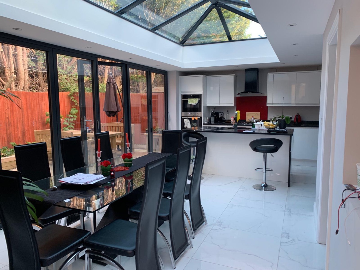 Open-plan kitchen and dining extension with roof lantern in Cambridge