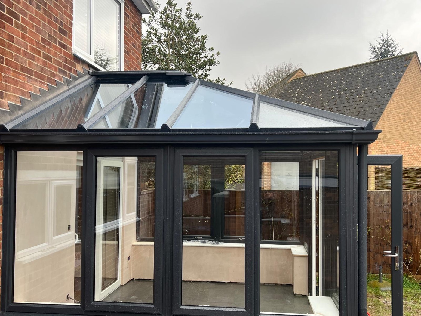 Modern black framed conservatory completed in Cambridge