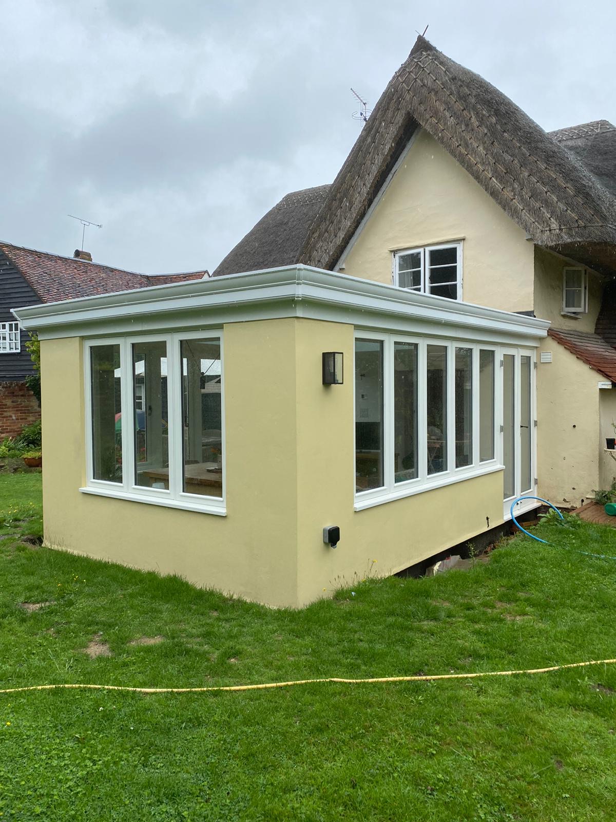 Rendered single storey extension on a character home near Cambridge
