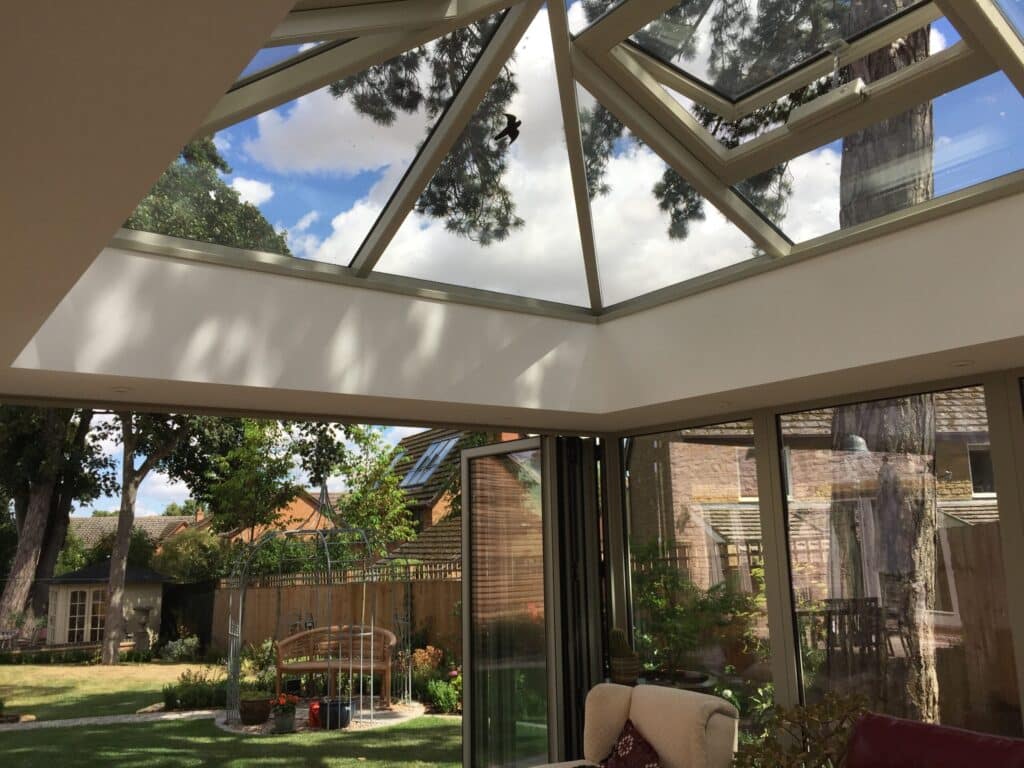 Orangery interior with plastered ceiling and glazed roof lantern