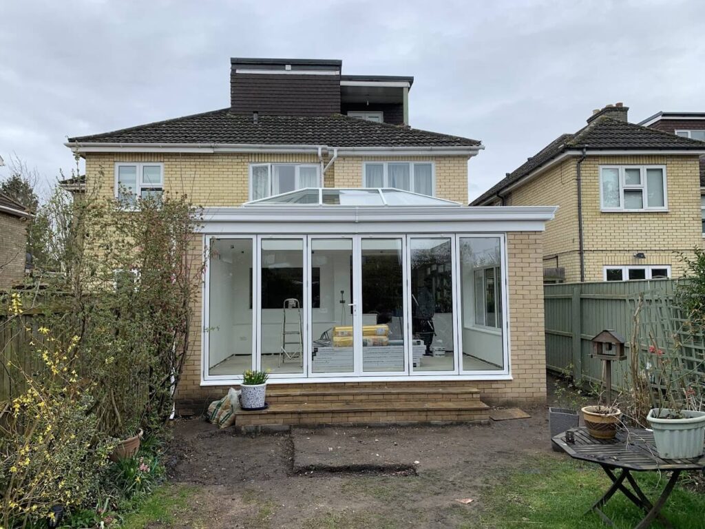 Rear extension with glazed French doors on a family home