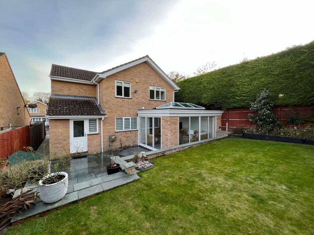 Rear extension and newly landscaped garden on a brick family home