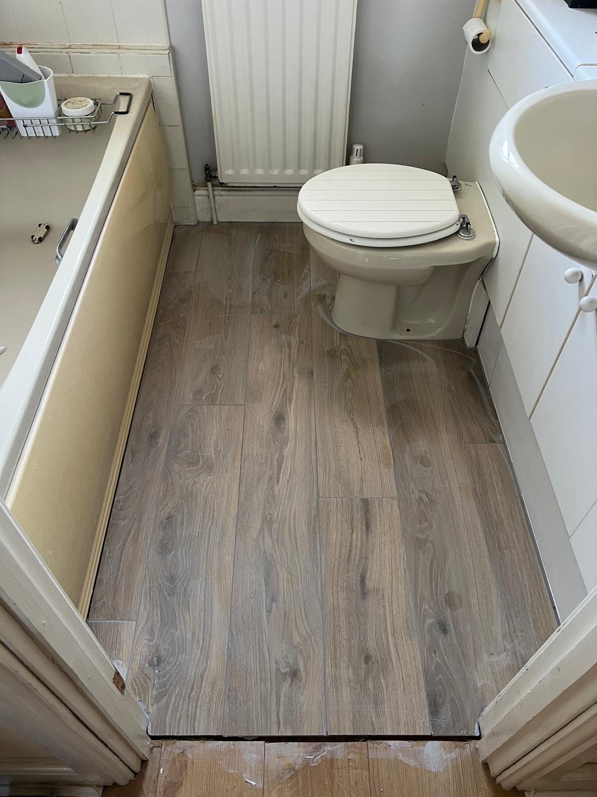 Bathroom floor tiling by Ciampa & Sons in Cambridge