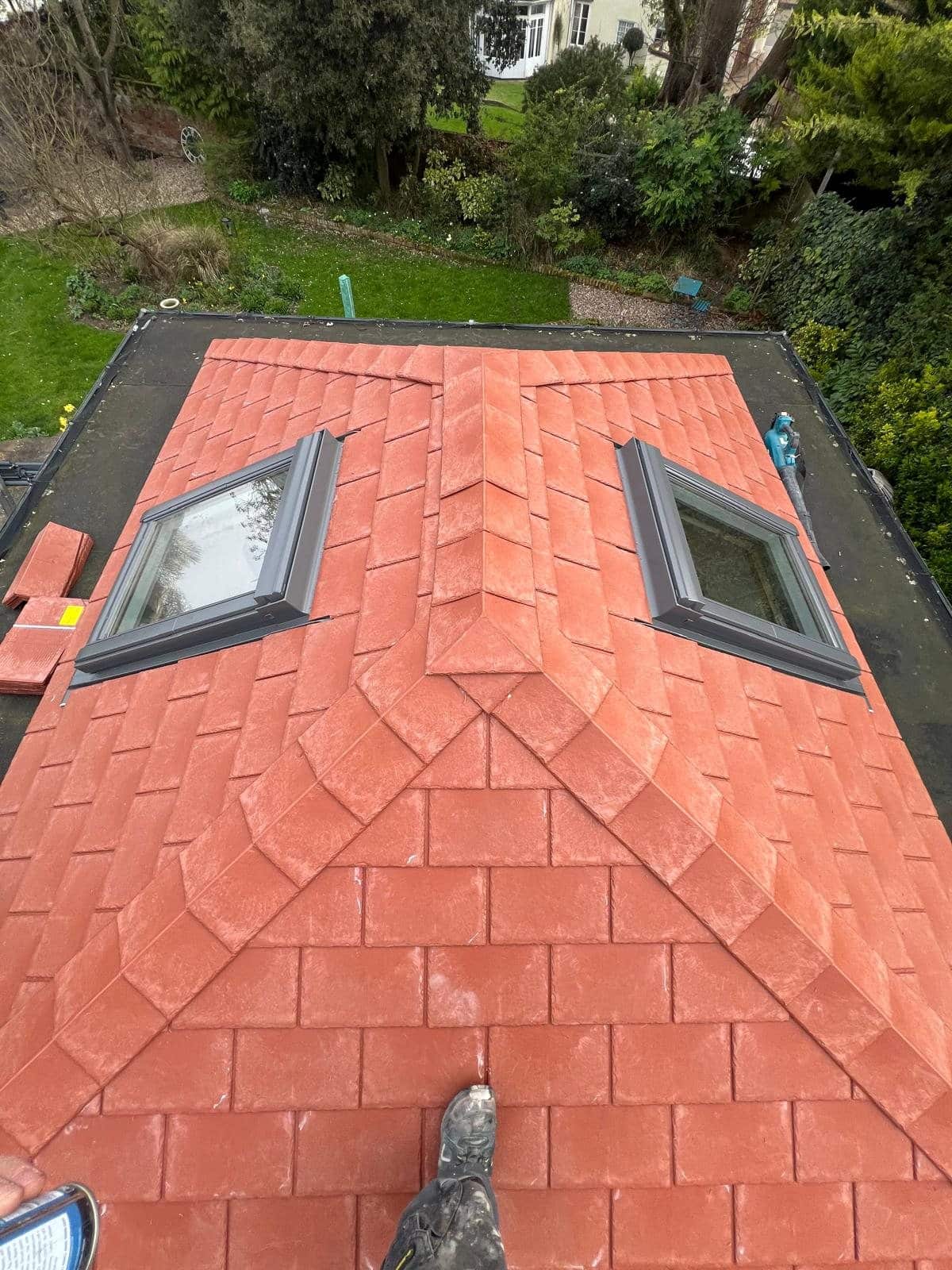 Roof alteration with rooflights by Ciampa & Sons in Cambridge