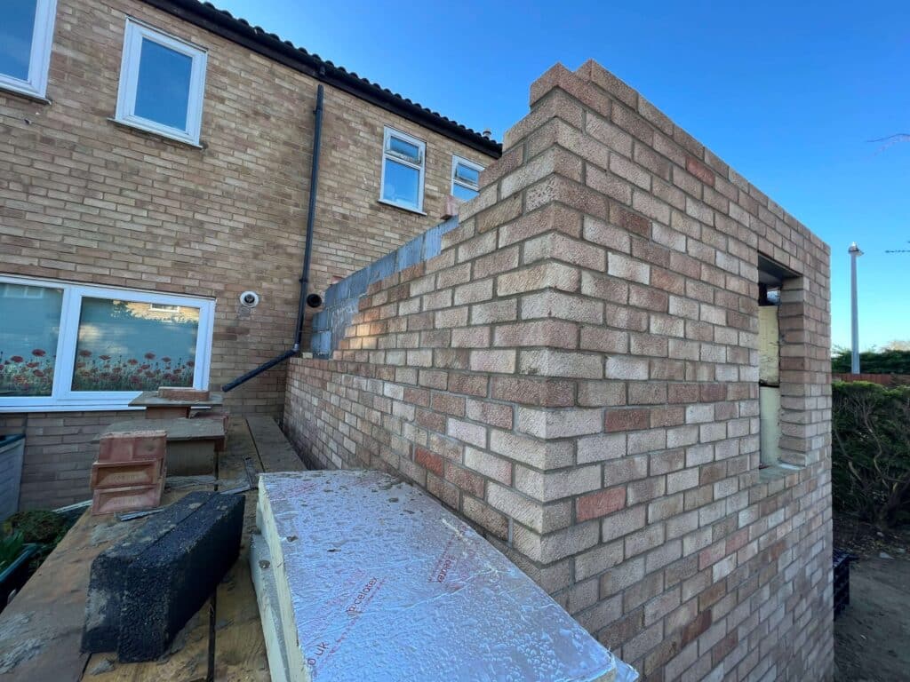 New brick walls going up for a single storey extension